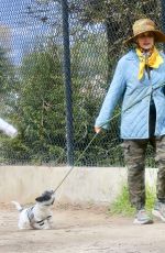 ANDIE MACDOWELL Out with Her Dog at Silverlake Reservoir Walking Trails 03/05/2023
