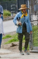 ANDIE MACDOWELL Out with Her Dog at Silverlake Reservoir Walking Trails 03/05/2023