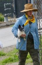 ANDIE MACDOWELL Out with Her Dog at Silverlake Reservoir Walking Trails 03/05/2023