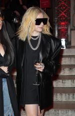 AVRIL LAVIGNE Arrives at Christian Louboutin Show at Paris Fashion Week 03/02/2023