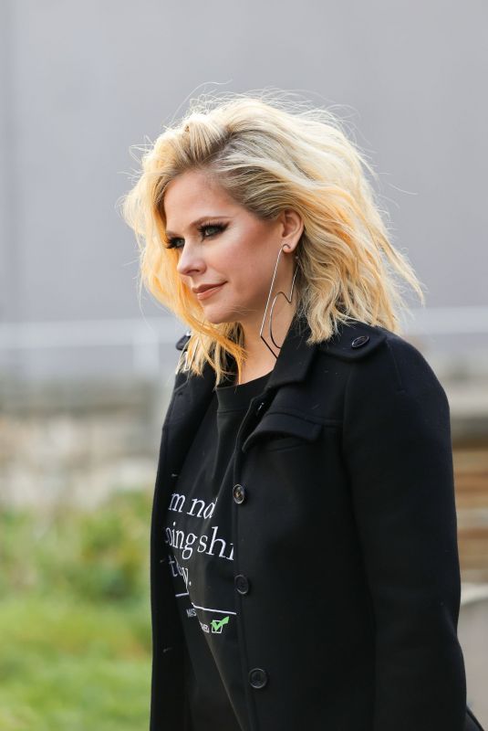 AVRIL LAVIGNE Arrives at Courreges Show at Paris Fashion Week 03/01/2023