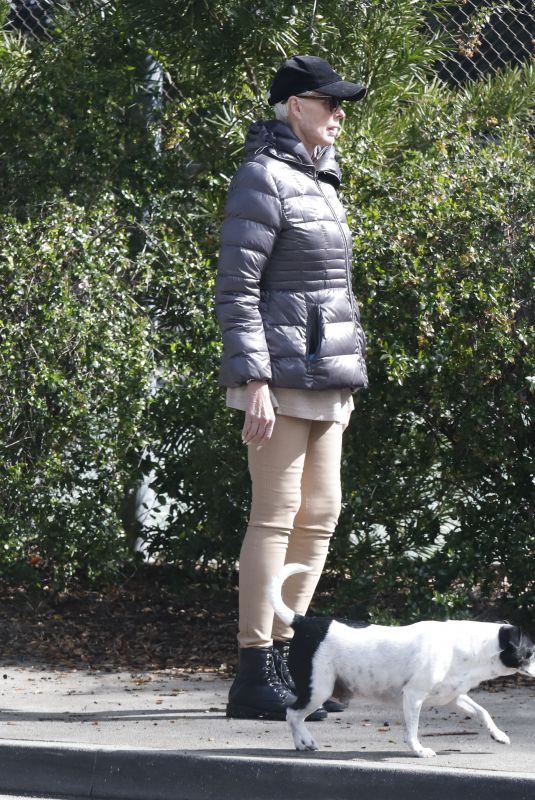 BRIGITTE NIELSEN Out with Her Dog at a Park in Los Angeles 03/02/2023