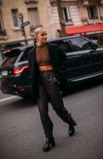 CAROLINE DAUR Arrives at Hermès Women