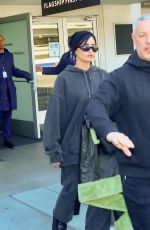 DEMI LOVATO and Jordan Lutes at LAX Airport in Los Angeles 03/07/2023