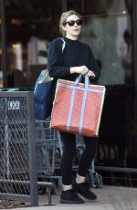 ELIZABETH OLSEN Leaves Erewhon Market in Los Angeles 03/08/2023