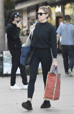 ELIZABETH OLSEN Leaves Erewhon Market in Los Angeles 03/08/2023