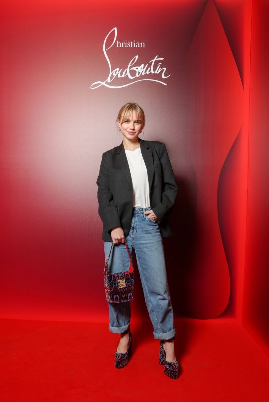 EMMA BROOKS at Christian Louboutin The Loubi Show in Paris 03/02/2023