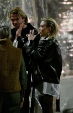 FLORENCE PUGH and Charlie Gooch Out for Dinner with friends at a Restaurant in Rome 03/25/2023