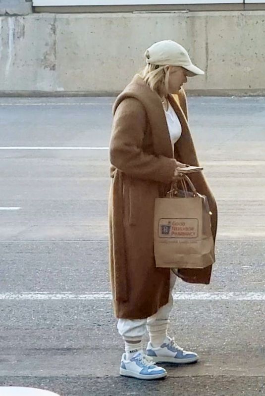 HILARY DUFF at a Airport in Los Angeles 03/24/2023