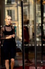 IRIS LAW Leaves Royal Monceau Hotel at Paris Fashion Week 03/02/2023