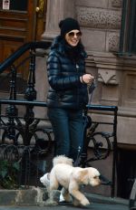 JULIANNA MARGUILES Out with Her Dog in New York 03/06/2023