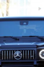 KOURTNEY KARDASHIAN and Travis Barker Out for Coffee at a Drive Thru in Los Angeles 02/27/2023