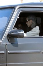 KOURTNEY KARDASHIAN and Travis Barker Out for Coffee at a Drive Thru in Los Angeles 02/27/2023