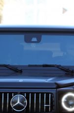 KOURTNEY KARDASHIAN and Travis Barker Out for Coffee at a Drive Thru in Los Angeles 02/27/2023