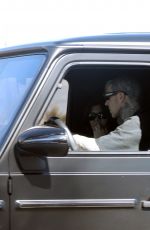 KOURTNEY KARDASHIAN and Travis Barker Out for Coffee at a Drive Thru in Los Angeles 02/27/2023