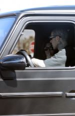 KOURTNEY KARDASHIAN and Travis Barker Out for Coffee at a Drive Thru in Los Angeles 02/27/2023