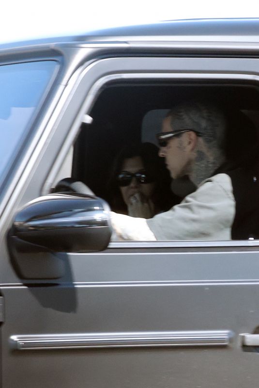 KOURTNEY KARDASHIAN and Travis Barker Out for Coffee at a Drive Thru in Los Angeles 02/27/2023