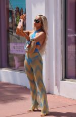 LISA OPIE Heading to Pretty Little Thing Pool Party in Miami 03/18/2023