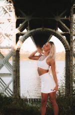 LIVVY DUNNE at a Photoshoot, March 2023