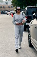 LORI HARVEY Leaves SEV Laser on Melrose Place in West Hollywood 03/29/2023