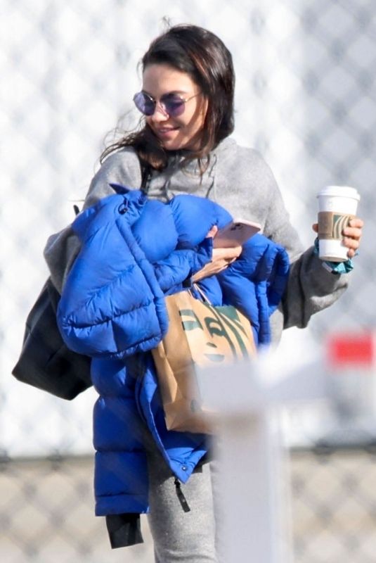 MILA KUNIS and Ashton Kutcher Loading up Their Luggage in Los Angeles 03/04/2023