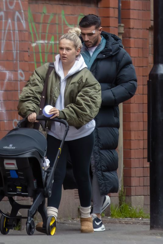 MOLLY MAE HAGUE and Tommy Furry Out with Their Baby in Manchester 03/03/2023