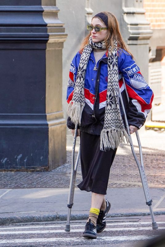 NATALIA DYER Walks with the Help of Crutches Out in New York 03/20/2023