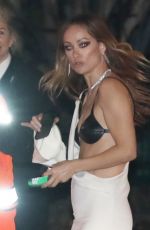 OLIVIA WILDE Leaves Vanity Fair Oscar Party in Beverly Hills 03/12/2023