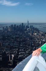 PEYTON ELIZABETH LEE Visits Empire State Building in New York 03/27/2023
