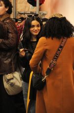 RACHEL ZEGLER and LUCY LIU Shopping at a Vintage Clothing Store in Rome 03/03/2023