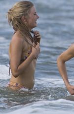 SYDNEY SWEENEY in a White Bikini Filming at a Beach in Australian Coast 03/06/2023