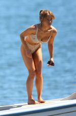 SYDNEY SWEENEY in Bikini at a Yacht Filming in Sydney 03/08/2023