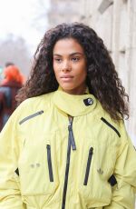 TINA KUNAKEY Arrives at Stella Mc Cartney Womenswear Fall/Winter 2023-2024 Show at Paris Fashion Week 03/06/2023