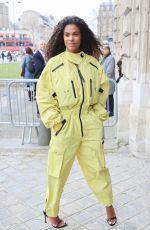 TINA KUNAKEY Arrives at Stella Mc Cartney Womenswear Fall/Winter 2023-2024 Show at Paris Fashion Week 03/06/2023