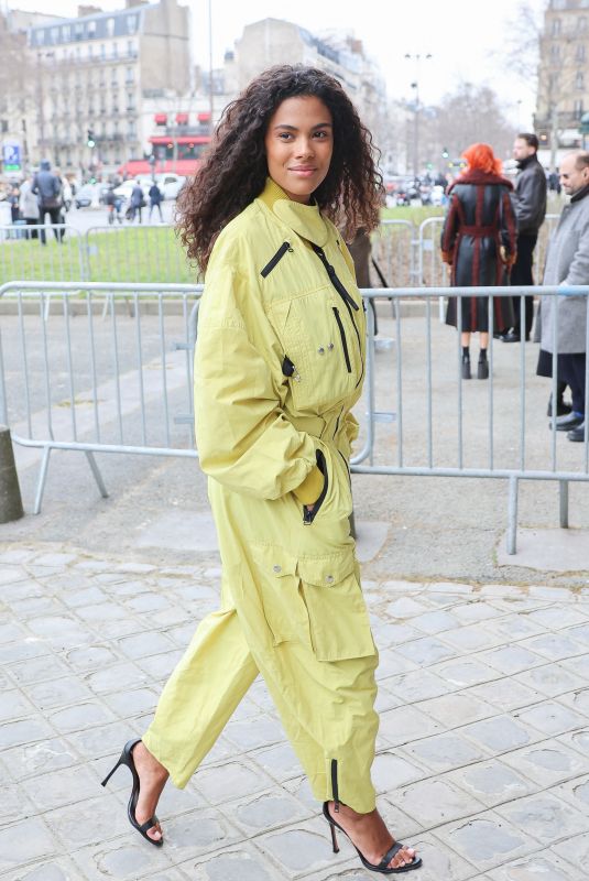 TINA KUNAKEY Arrives at Stella Mc Cartney Womenswear Fall/Winter 2023-2024 Show at Paris Fashion Week 03/06/2023