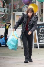 ZOOEY DESCHANEL Shopping at a Toy Store in Los Angeles 03/11/2023