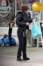 ZOOEY DESCHANEL Shopping at a Toy Store in Los Angeles 03/11/2023