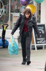ZOOEY DESCHANEL Shopping at a Toy Store in Los Angeles 03/11/2023