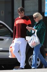 ASHLEY BENSON and Brandon Davis Leaves a Petco Pet Shop in West Hollywood 04/19/2023