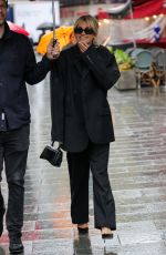 ASHLEY ROBERTS Arrives at Heart Radio in London 04/21/2023