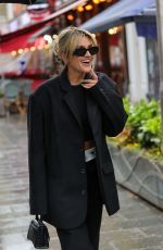 ASHLEY ROBERTS Arrives at Heart Radio in London 04/21/2023