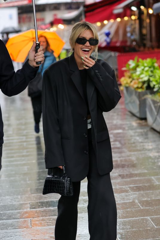 ASHLEY ROBERTS Arrives at Heart Radio in London 04/21/2023