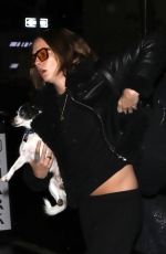 CARA DELEVINGNE with Her Dog Arrives at Her Hotel in New York 04/28/2023