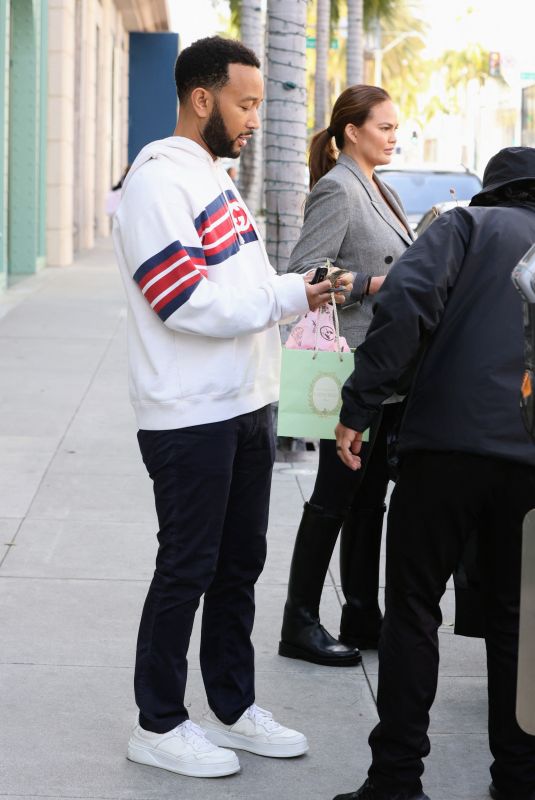 CHRISSY TEIGEN and John Legend Shopping at Gucci in Beverly Hills 04/14/2023