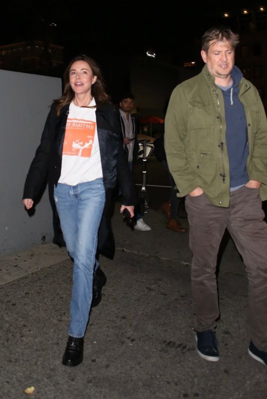 CHRISTA MILLER and Bill Lawrence Arrives at Their Daughter Charlotte Lawrence Show at Hotel Cafe Live Music Bar in Los Angeles 04/05/2023