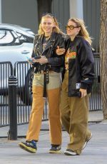 CODY HORN Arrives with a Friend at Lakers Playoff Game in Los Angeles 04/2/2023