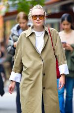 DAKOTA FANNING Out and About in New York 04/22/2023