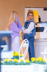 DENISE RICHARDS and LOLA SHEEN at La La Land Restaurant in Calabasas 04/06/2023