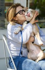 EDIE FALCO Out with Her Dog Mackie in New York 04/20/2023