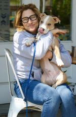 EDIE FALCO Out with Her Dog Mackie in New York 04/20/2023